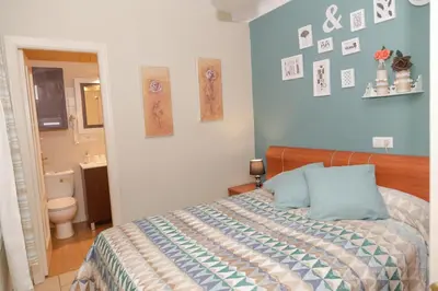 Cama o camas de una habitación en Pension Internacional