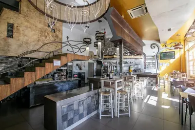 Un restaurante o sitio para comer en Hotel ACG