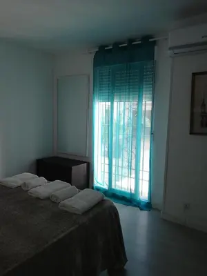 Cama o camas de una habitación en Vivienda Turistica Diseño en los Patios de San Basilio