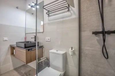 Un baño de El Oasis de San Pedro