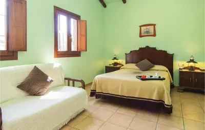 Cama o camas de una habitación en Gorgeous Home In Villaviciosa De Córdo