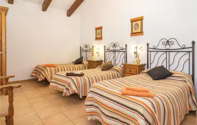 Cama o camas de una habitación en Gorgeous Home In Villaviciosa De Córdo