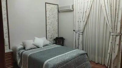 Cama o camas de una habitación en Hotel Casa Marchena