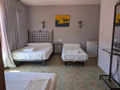 Cama o camas de una habitación en Hotel Casa Marchena