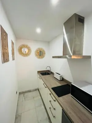 Una cocina o zona de cocina en Casa Qurtuba