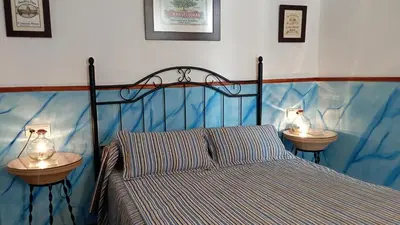 Cama o camas de una habitación en Barrio Nuevo
