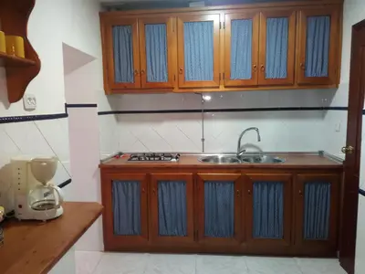 Una cocina o zona de cocina en Barrio Nuevo