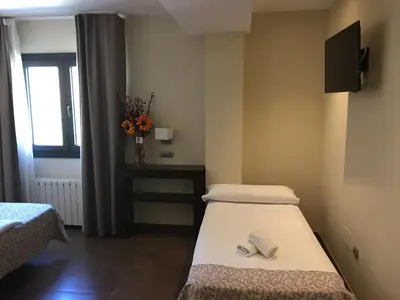 Cama o camas de una habitación en Hotel Restaurante El Corte