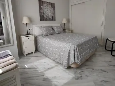 Cama o camas de una habitación en Santa Justa Sevilla Nervion Buhaira Centro