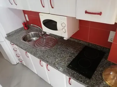 Una cocina o zona de cocina en Apartamento centro