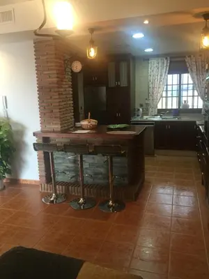 Una cocina o zona de cocina en Casa Cuatro Vientos - Casabermeja