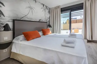 Cama o camas de una habitación en Slow Suites Setas
