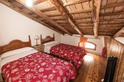 Cama o camas de una habitación en El Molino del Corcho