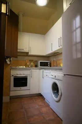 Una cocina o zona de cocina en Feria Palace Apartment