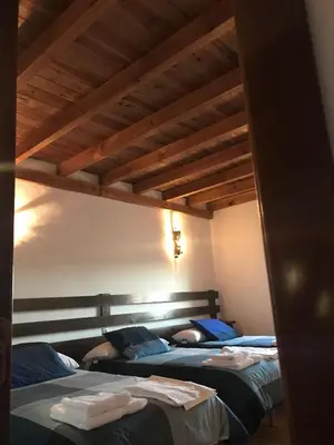 Cama o camas de una habitación en VTAR Don Benito, su casa rural en Gilena
