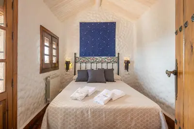 Cama o camas de una habitación en La Casa de Alejandro