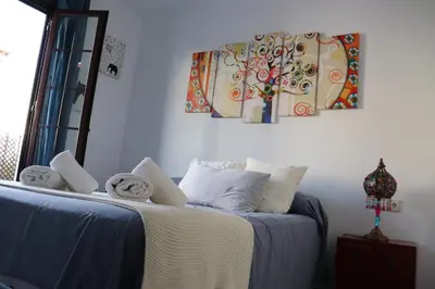 Cama o camas de una habitación en Apartamento Turístico La Vega