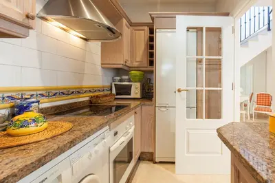 Una cocina o zona de cocina en Espectacular apartamento con terraza privada parking