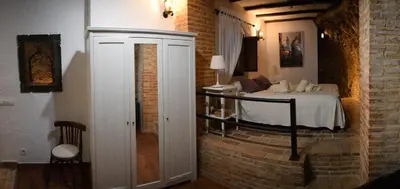 Cama o camas de una habitación en Casa Cueva El Pocito