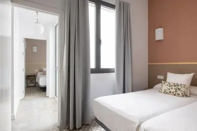 Cama o camas de una habitación en La Francesa Alameda