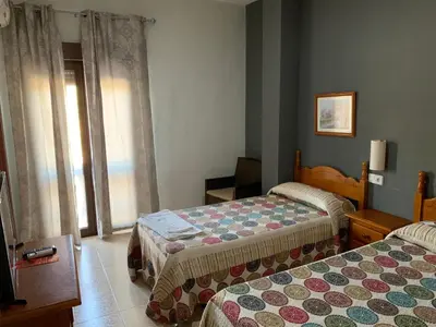 Cama o camas de una habitación en Hotel-Restaurante la Loma