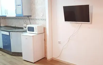 Una cocina o zona de cocina en HISPALIS SAN LUIS