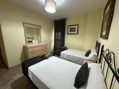 Cama o camas de una habitación en DS Orillas del Guadalquivir y la Mezquita