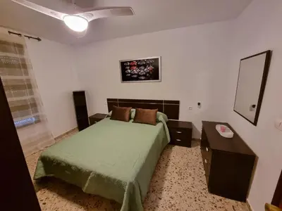 Cama o camas de una habitación en Vivienda Turística en la Muralla de San Basilio