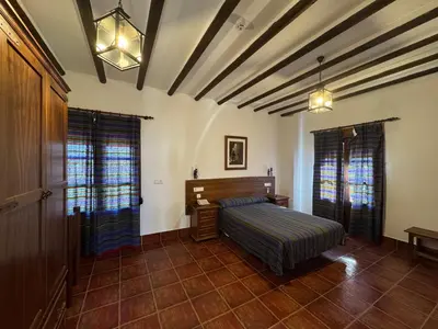 Cama o camas de una habitación en Posada de Jose Mª El Tempranillo
