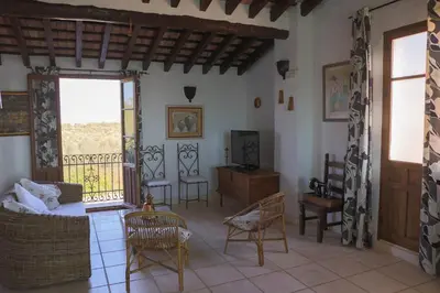 Una televisión o centro de entretenimiento en Hotel Rural Hoyo Bautista