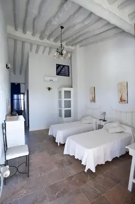 Una televisión o centro de entretenimiento en Hotel Rural Hoyo Bautista