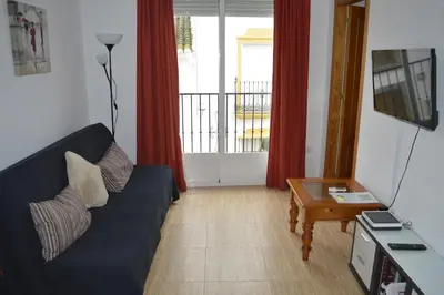Una televisión o centro de entretenimiento en Apartamento Steven