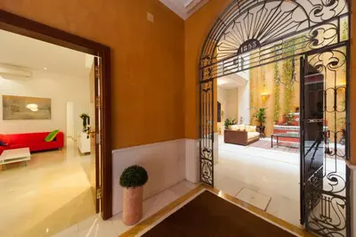 Cama o camas de una habitación en Logia Sevilla