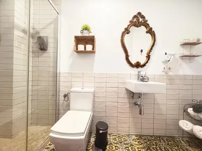 Un baño de Palace House Hércules Apartments