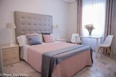 Cama o camas de una habitación en Los patios “ El Carmen”