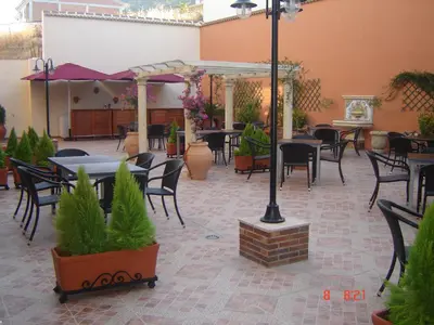 Un restaurante o sitio para comer en Hotel Ciudad de Martos