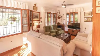 Una televisión o centro de entretenimiento en Casa Rural Santa Ana