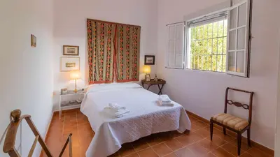 Cama o camas de una habitación en Casa Rural Santa Ana