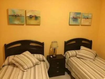 Cama o camas de una habitación en Hostal el mirador