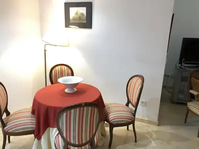 Una televisión o centro de entretenimiento en Alojamiento Ronda de los Tejares