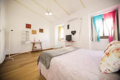 Cama o camas de una habitación en Casa singular y con encanto