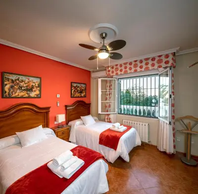 Cama o camas de una habitación en Vivienda Turística Rural Mari Carmen