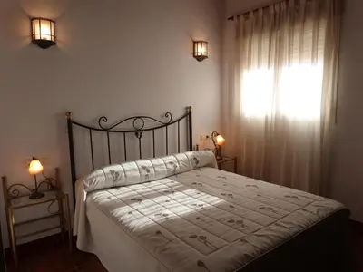 Cama o camas de una habitación en Hostal Restaurante Las Canteras