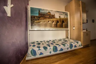 Cama o camas de una habitación en Ático Azahar