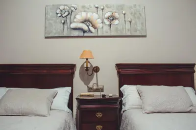 Cama o camas de una habitación en La Morona Hotel