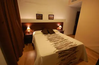 Cama o camas de una habitación en Hotel Hospederia San Francisco