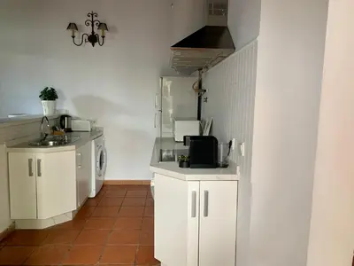 Una cocina o zona de cocina en Apartamentos Los Patios de la Judería