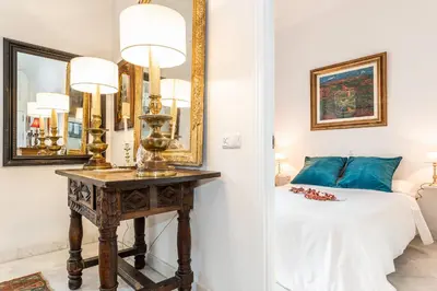 Cama o camas de una habitación en Waou Sevilla Skyline