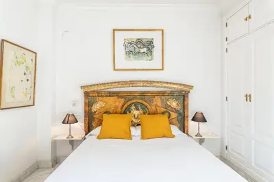 Cama o camas de una habitación en Waou Sevilla Skyline