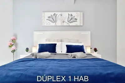 Cama o camas de una habitación en Casas Caballerizas Mezquita 1 y 3 HAB